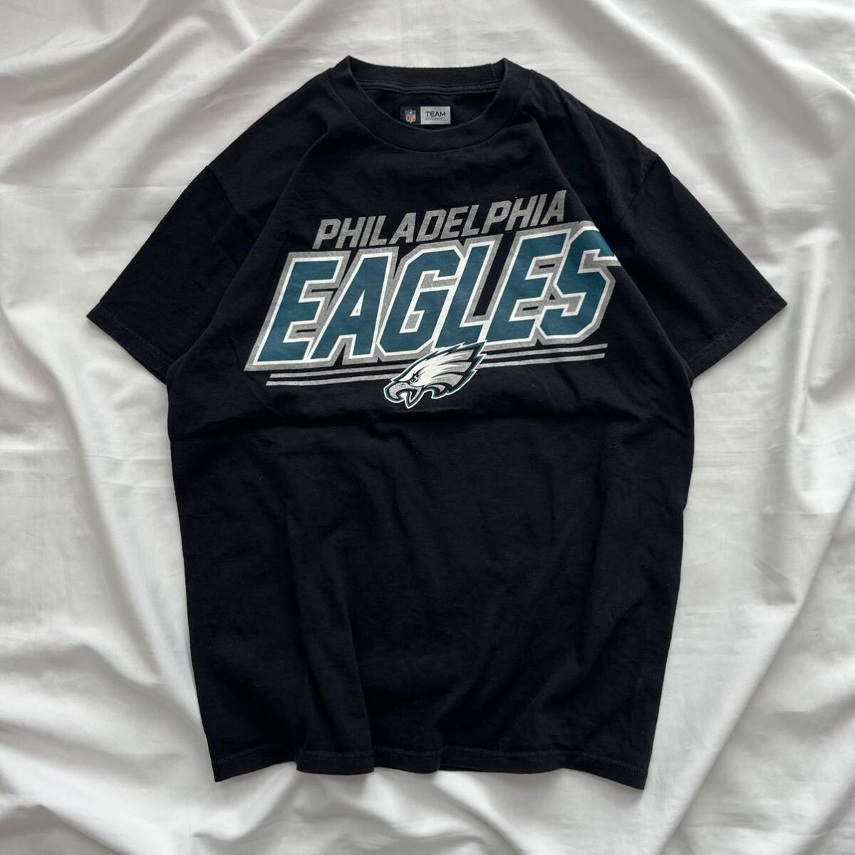 Tシャツ 半袖 NFL フィラデルフィアイーグルス PHILADELPHIA EAGLES プリント ロゴ 黒 ブラック Mサイズ チームアパレル 送料込_画像1