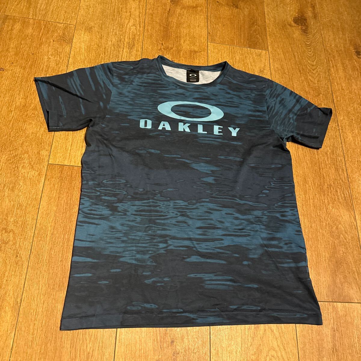 OAKLEY 半袖Tシャツ SIZE L スポーツウェア　_画像1