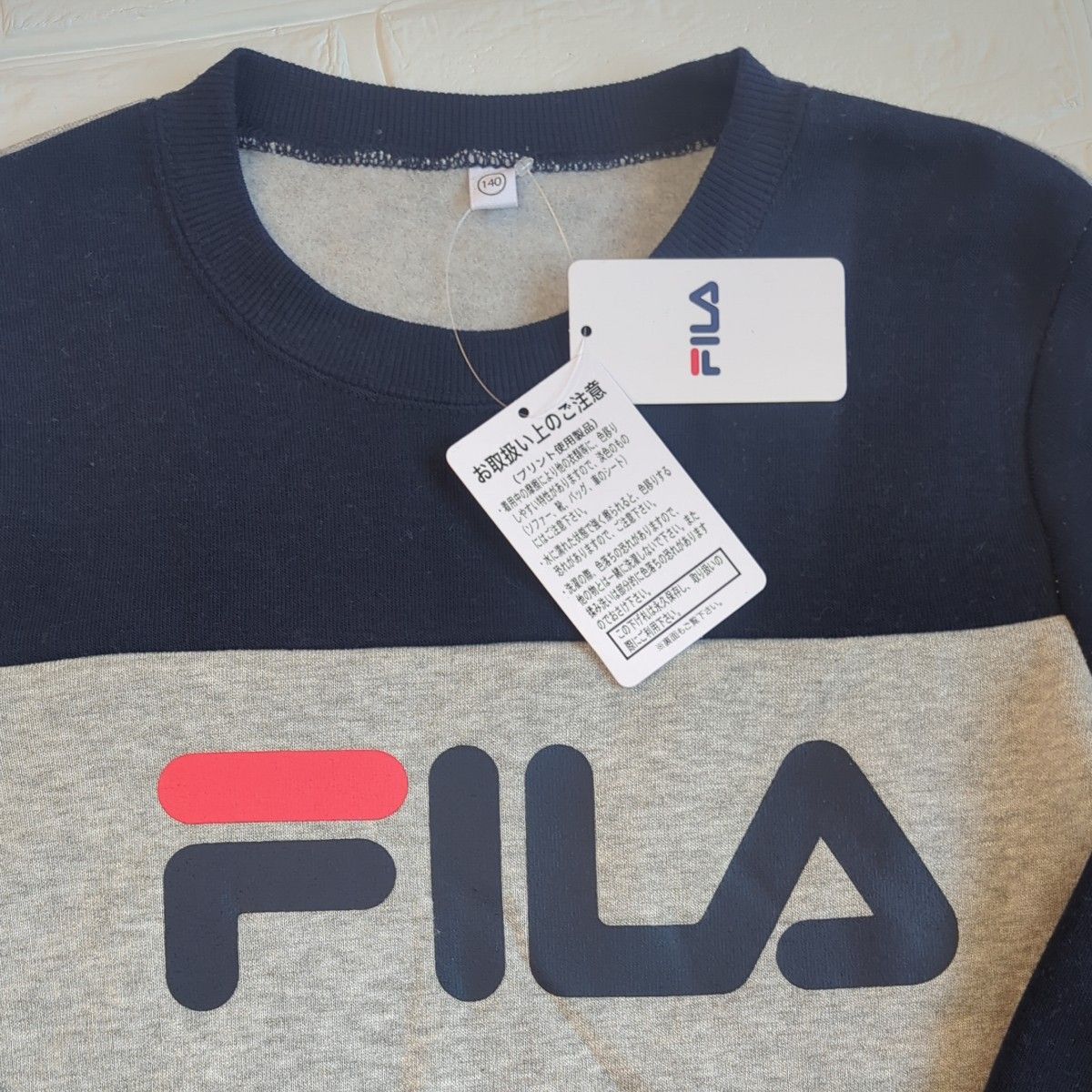 【新品】タグつき　FILA　フィラ　裏起毛ワンピースタイプトレーナー　スウェット　サイズ140　Aライン　ゆったり