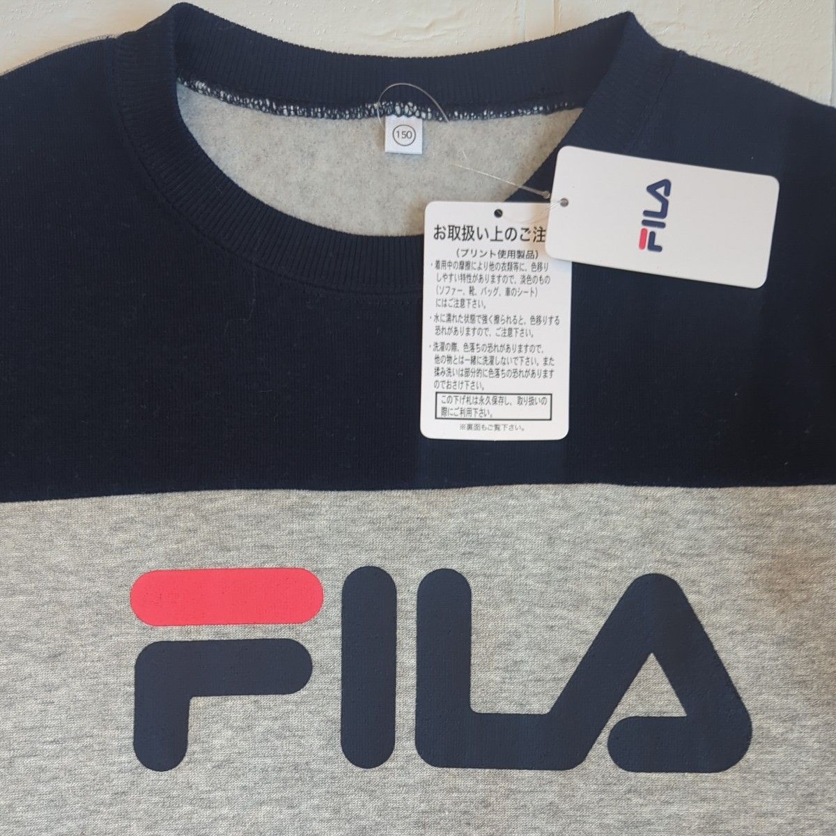 【新品】タグつき　FILA　フィラ　裏起毛ワンピースタイプトレーナー　スウェット　サイズ150　Aライン　ゆったり