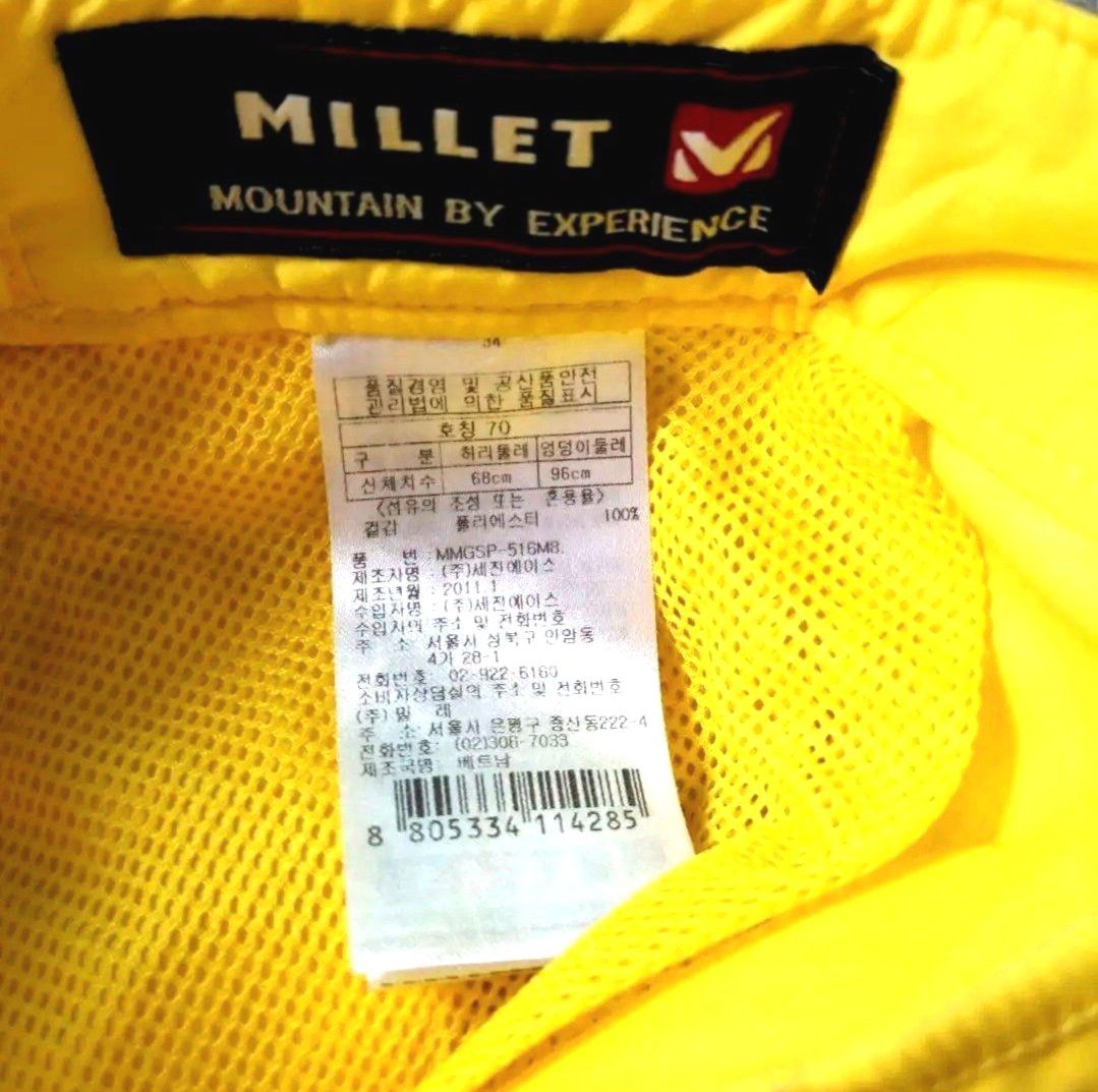 新品！タグ付き！MILLET　ミレーアウトドアパンツイエロー 登山 レインウェア　防寒　トレッキング 黄色
