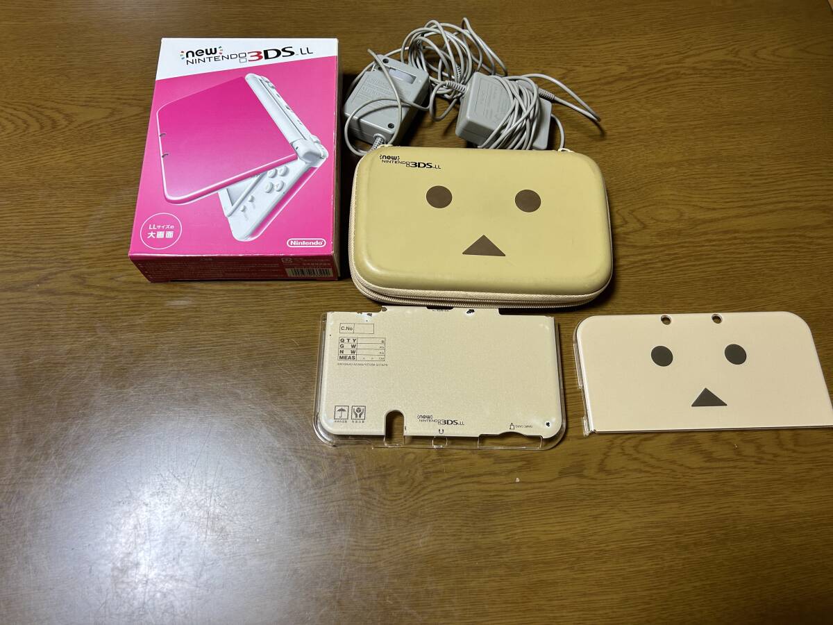 Newニンテンドー3DS LL ピンク×ホワイト 中古 美品 + 充電器2個 + ダンボー カバー ケース _画像1