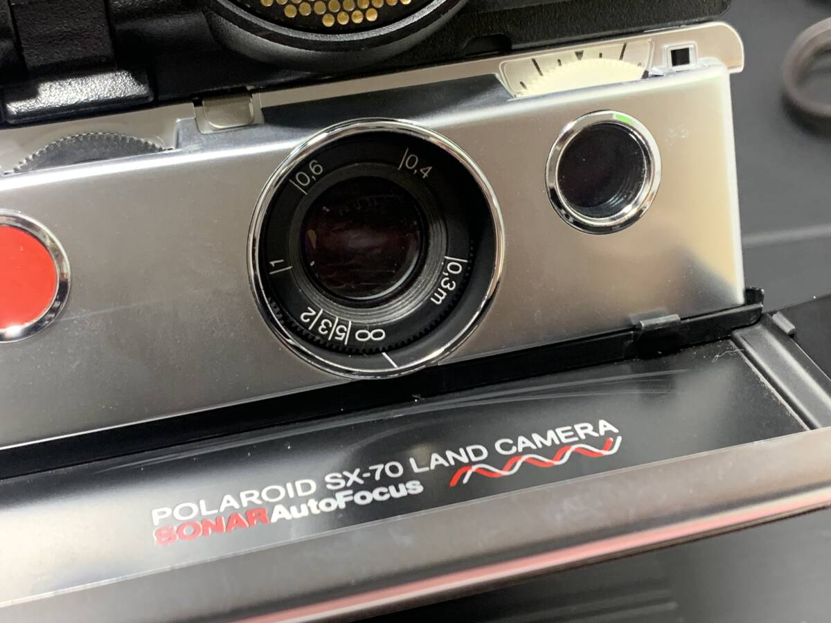 Polaroid Polaroid SX-70 LAND CAMERA SONAR Auto Focus instant film camera storage sack have photograph addition have 