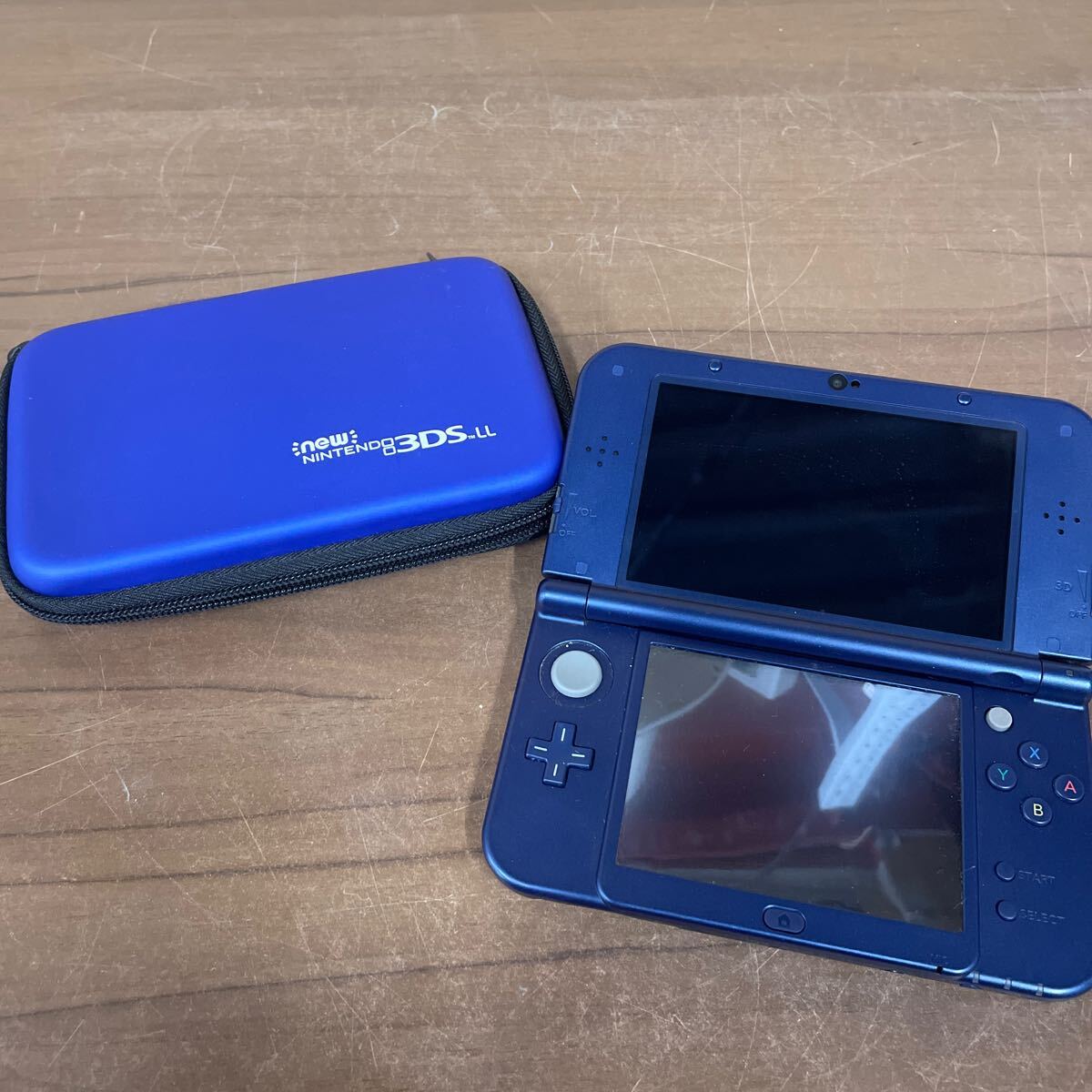 UTs89 【簡易動作確認済み】 任天堂 Nintendo ニンテンドー Newニンテンドー3DS LL ゲー厶機 本体 RED-001 メタリックブルー ケース付き_画像1