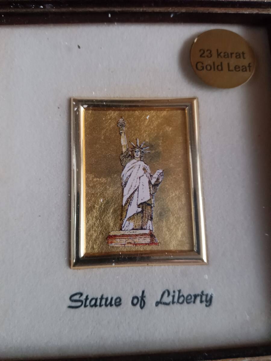  beautiful goods 23k gold . art America free woman god New York gold . ornament .*0224
