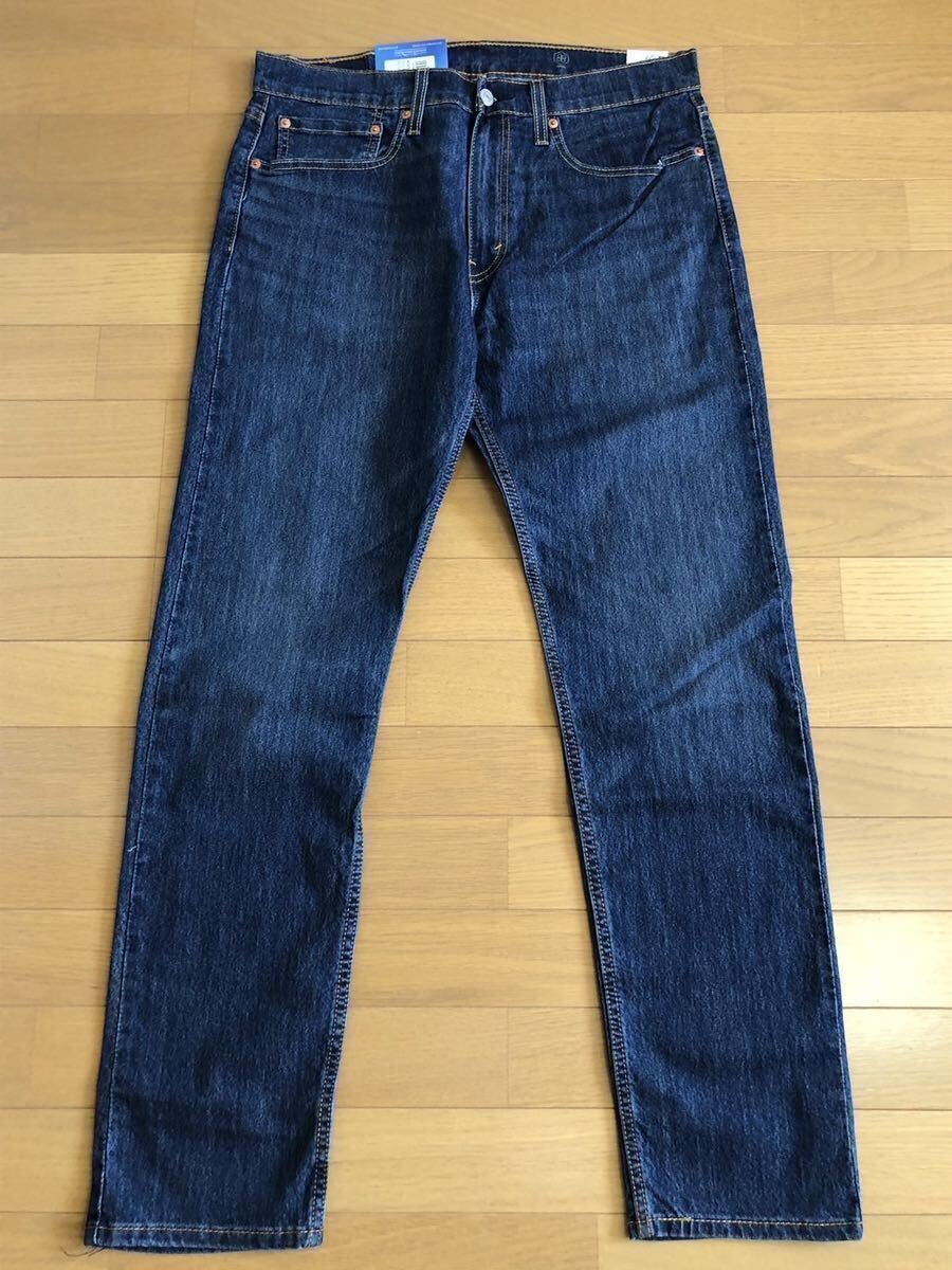 Levi's 502 TAPER COOL WORN INダークインディゴW34 L32の画像3