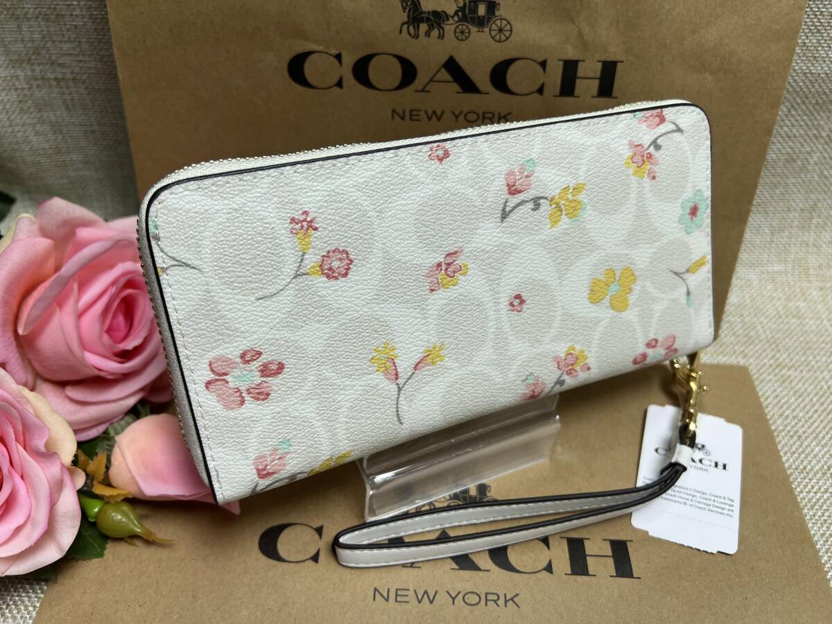 コーチ COACH 財布 レディース 長財布 フローラルプリント花柄 ストラップ ラウンドファスナー シグネチャー ピンク レザー C8695 A101 