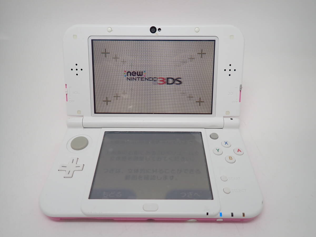 44855 ★ Nintendo 任天堂 3DS LL ピンク×ホワイト RED-001 初期化済み 充電コード付 おまけカセット付 ★ 中古品 動作確認済み_画像1