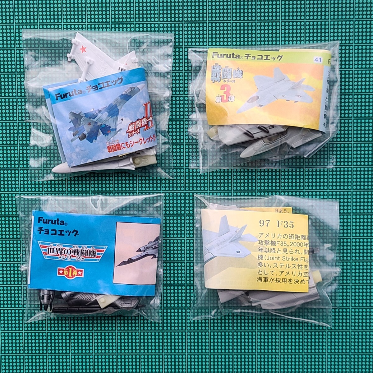 【中古】チョコエッグ　戦闘機シリーズ　第3弾　F-22 ラプター　その他　解説書付き　フィギュア_画像1