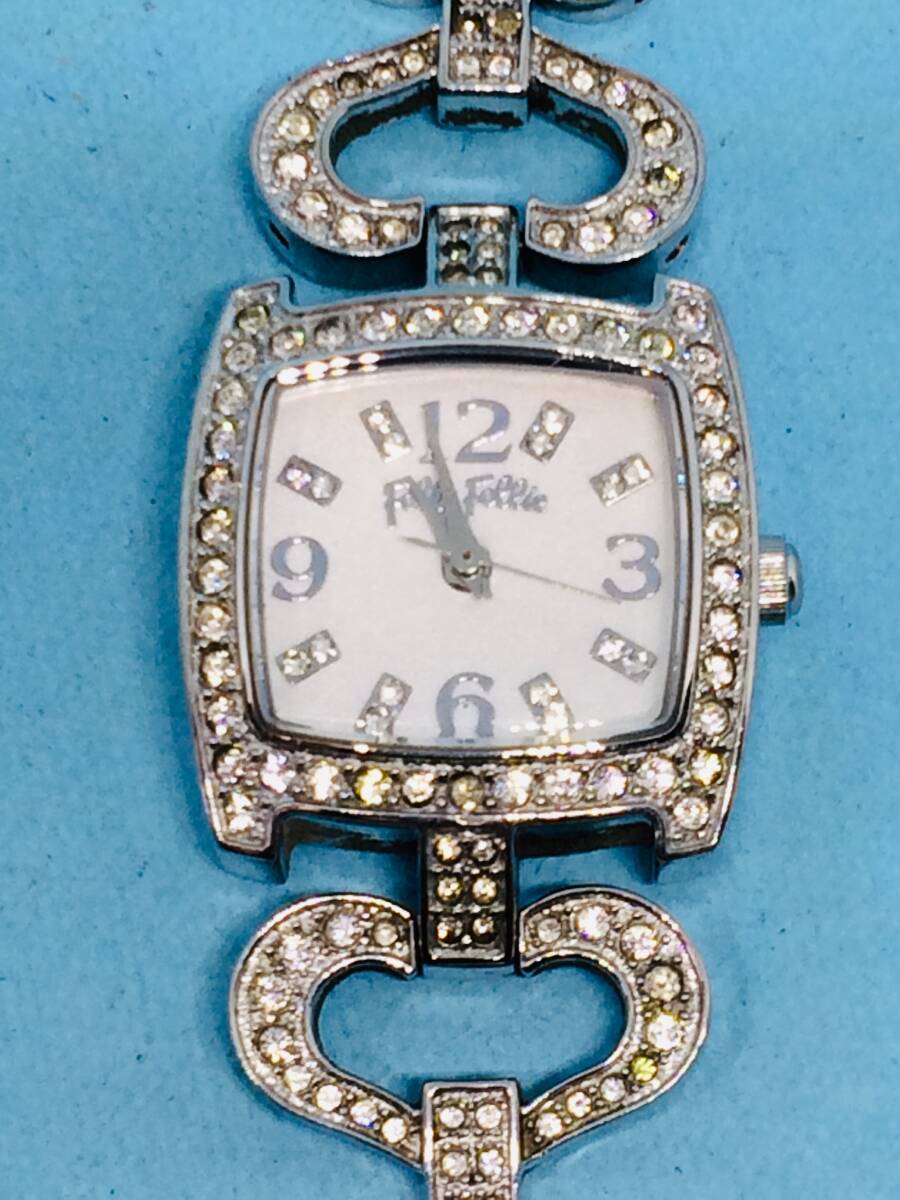 (E18) Folli Follie (*\'v\') Folli*Follie( battery replaced ) silver * Lady's wristwatch USED( postage nationwide equal 185 jpy ) stylish clock..