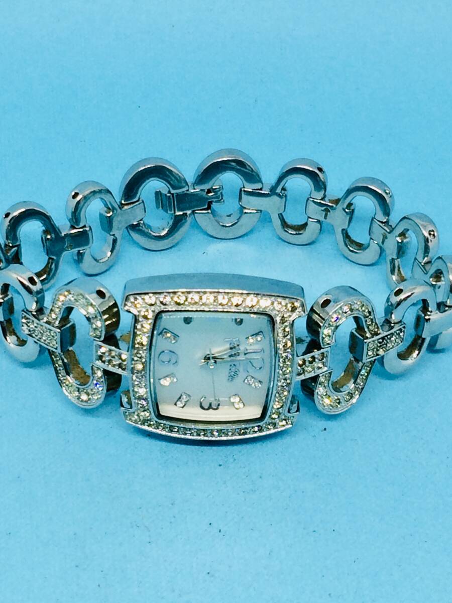 (E18) Folli Follie (*\'v\') Folli*Follie( battery replaced ) silver * Lady's wristwatch USED( postage nationwide equal 185 jpy ) stylish clock..