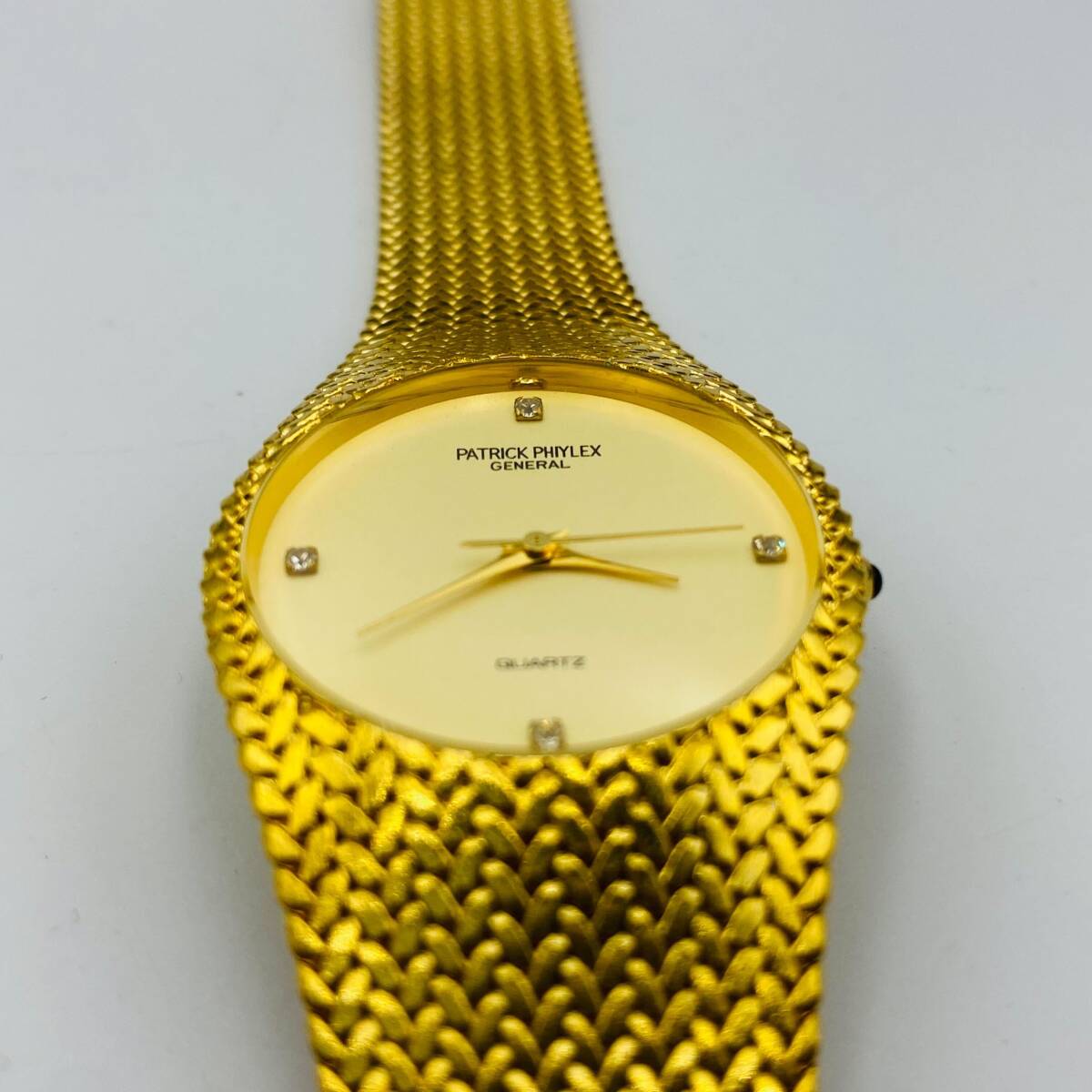 ♪A77191:PATRICK PHIYLEX GENERAL パトリックフィレックス 18KGP クォーツ腕時計 ゴールド ラインストーン 箱付 ジャンクの画像3