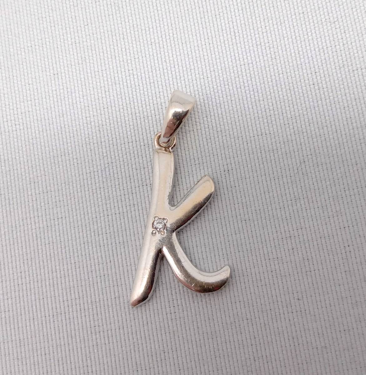 輝く高品質な K18WG トップ 1.1g ダイヤ0.01ct ホワイトゴールド