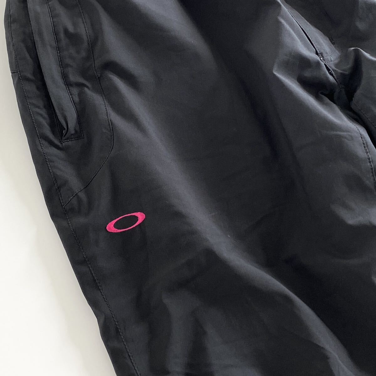 Ac29 OAKLEY オークリー ロングパンツ サイズL ブラック メンズ スポーツウェア 裾ドローコード ジップアップ ロゴ 刺繍 ボトムス_画像6