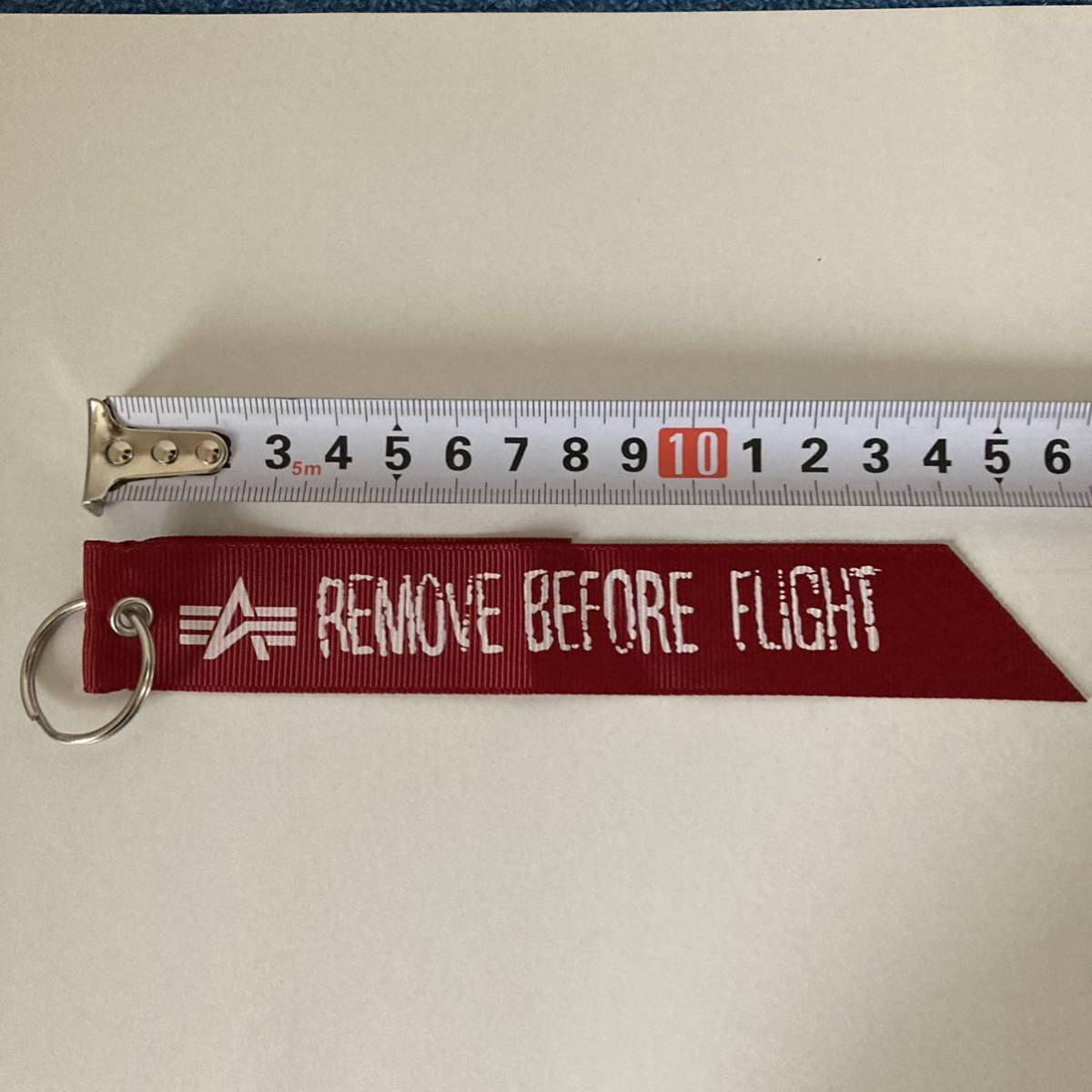 アルファ インダストリーズ ALPHA INDUSTRIES INC 赤 タグ リボン ブランドタグ ma1 n2b n3b REMOVE BEFORE_画像1