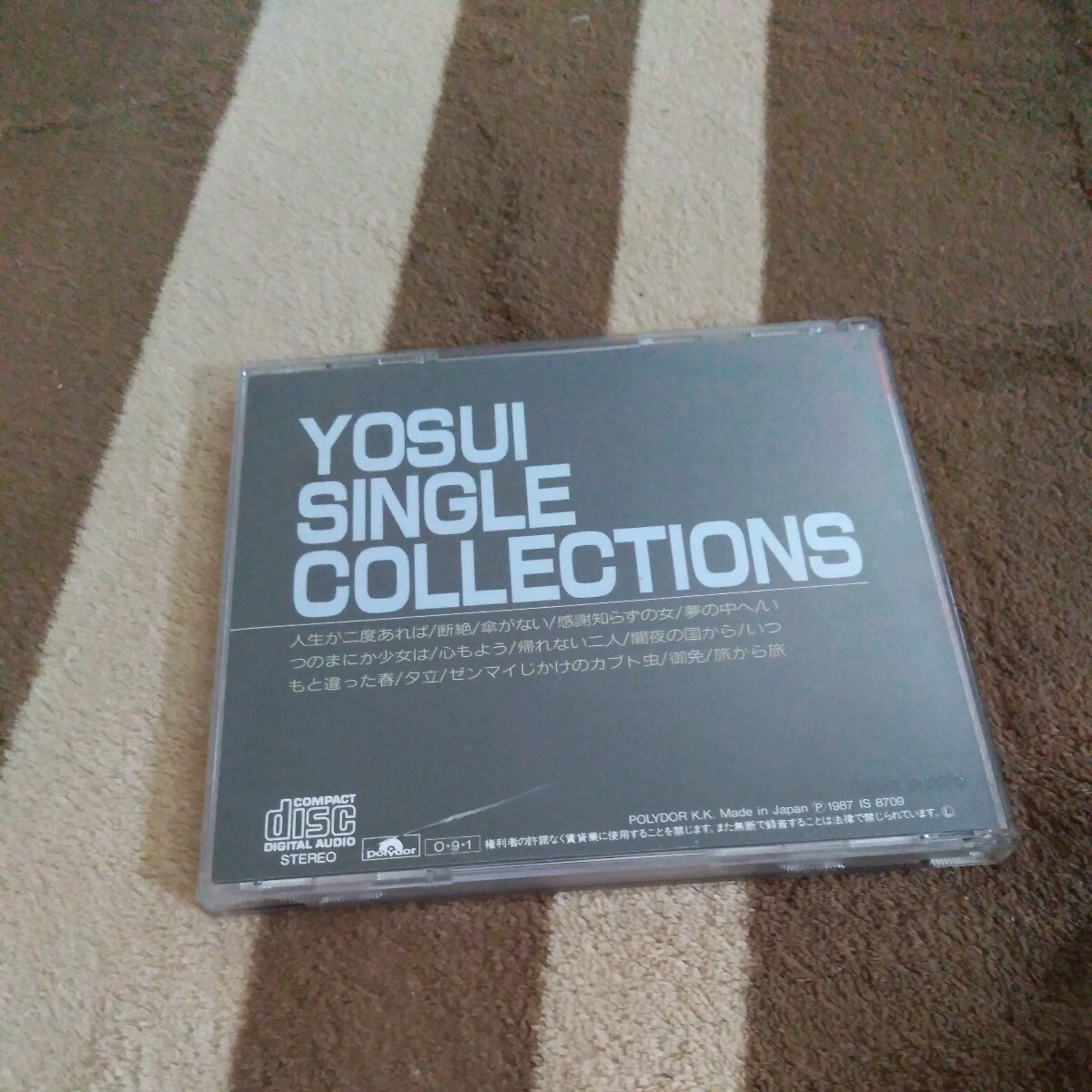 井上陽水 シングルコレクション CD YOSUI SINGLE COLLECTIONS 傘がない 夢の中へ 人生が2度あれば 感謝知らずの女 旅から旅 夕立 心もようの画像2