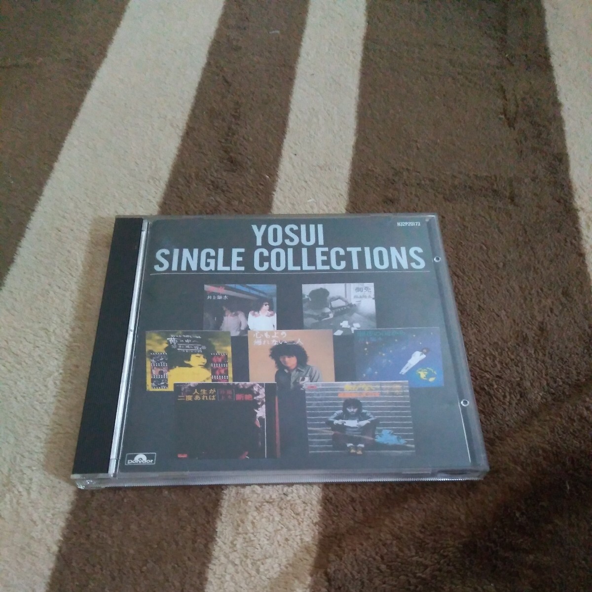 井上陽水 シングルコレクション CD YOSUI SINGLE COLLECTIONS 傘がない 夢の中へ 人生が2度あれば 感謝知らずの女 旅から旅 夕立 心もようの画像1