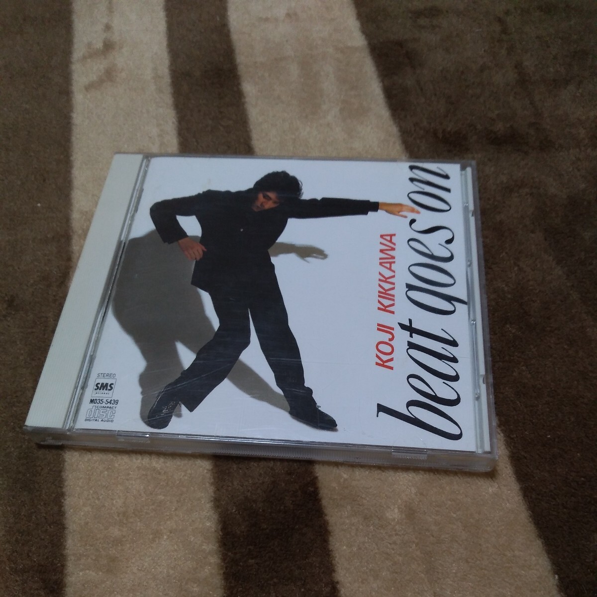 CD 吉川晃司 ベスト・アルバム BEAT GOES ON モニカ サヨナラは八月のララバイ ラ・ヴィアンローズ にくまれそうなNEWフェイス MD35-5439_画像1
