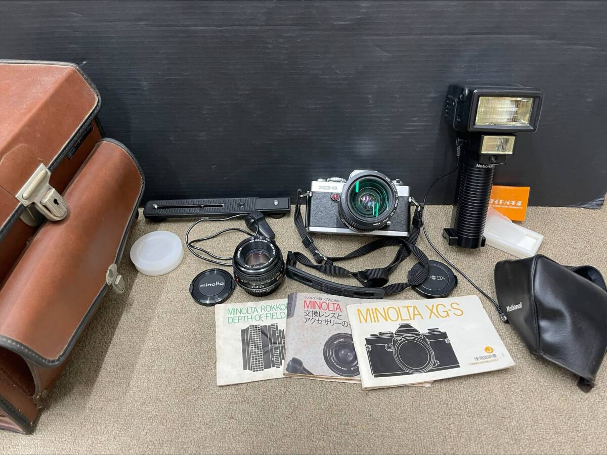 #6085 minolta XG-S ミノルタ 一眼レフ　レンズ フラッシュ ケース 舟付き ジャンク 動作未確認 現状保管品_画像1