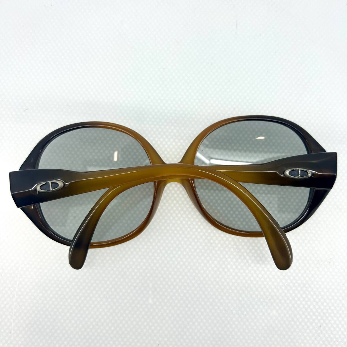 Christian Dior sunglasses brown group fashion accessories 