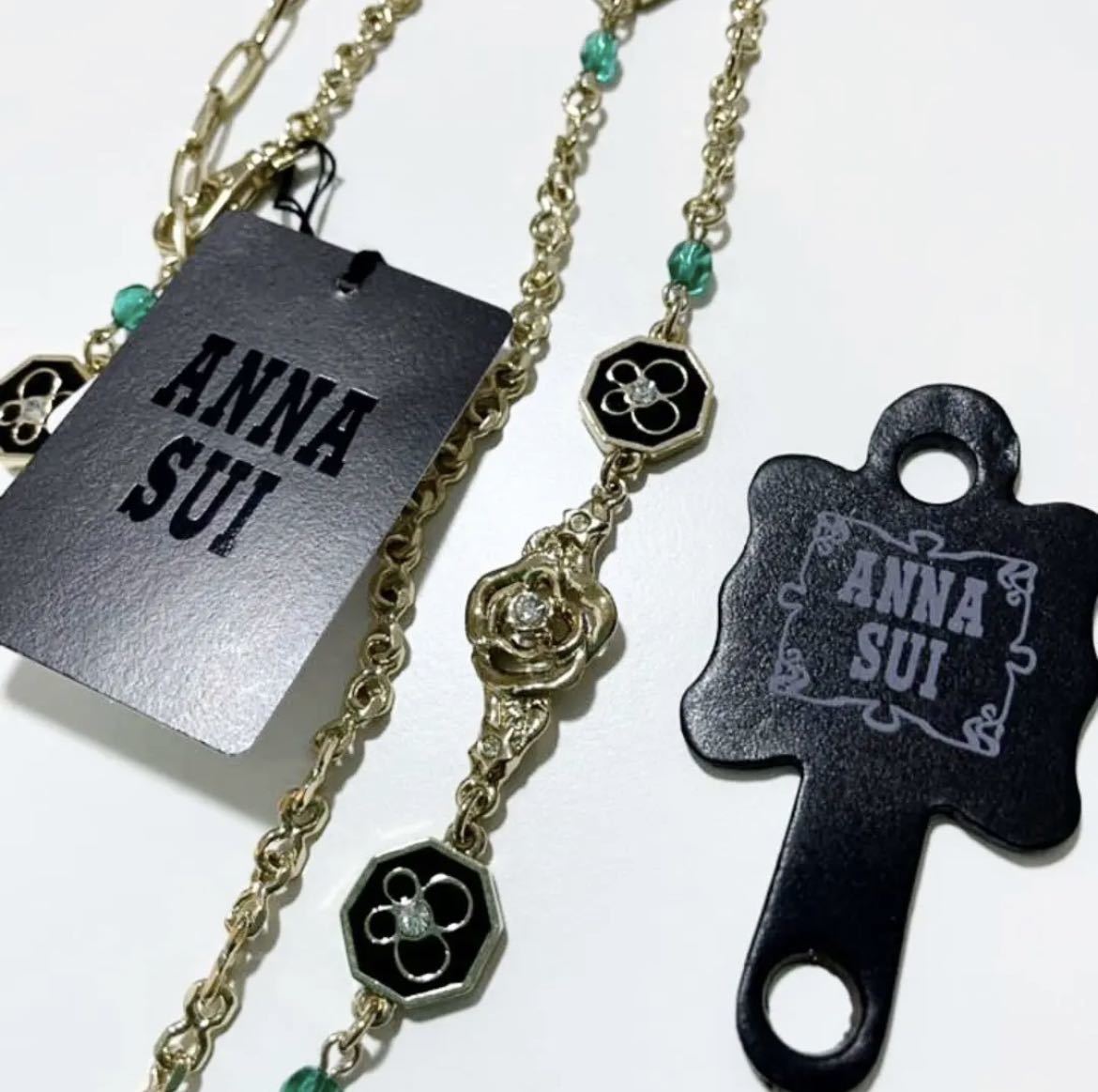 d2訳あり 新品 【 ANNA SUI アナスイ 】 日本製 アクセサリー ロングネックレス バッグチャーム チェーンベルト 百貨店 ブランド ゴールド_画像2