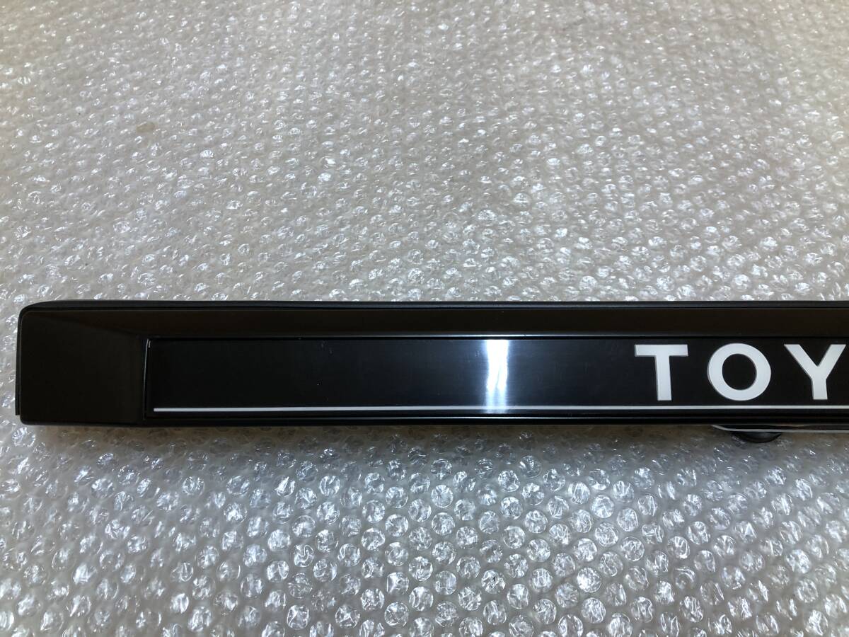 * new goods * TOYOTA Toyota TR20G YR20G Master Ace Surf original rear garnish rear gate center panel number light Town Ace 