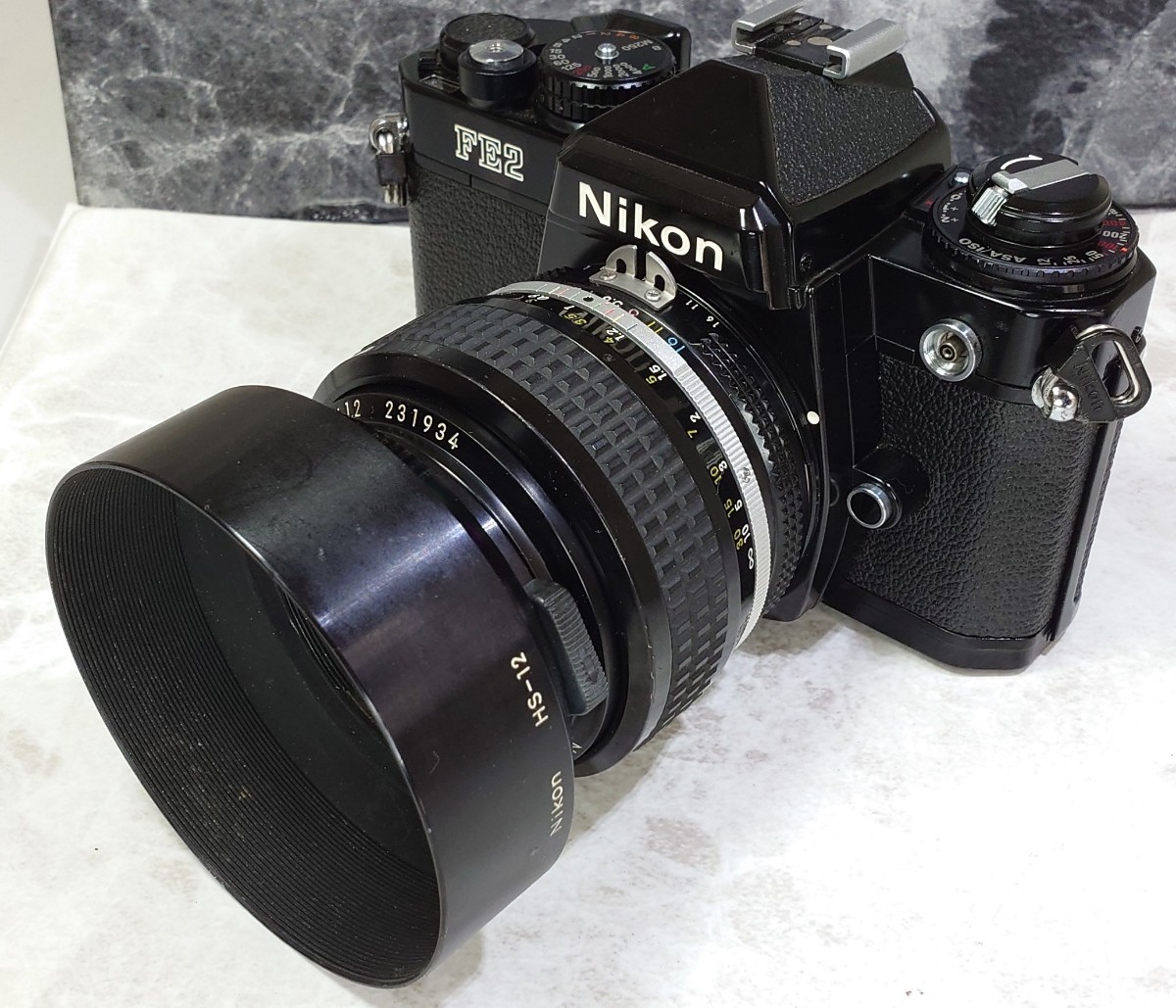 【終活コレクション整理】 Nikon FE2黒＋Ai NIKKOR 50mm f1.2 シンデレラ単焦点 純正メタルフード付 各動作良好 露出計メーターOK 光学美品_画像3