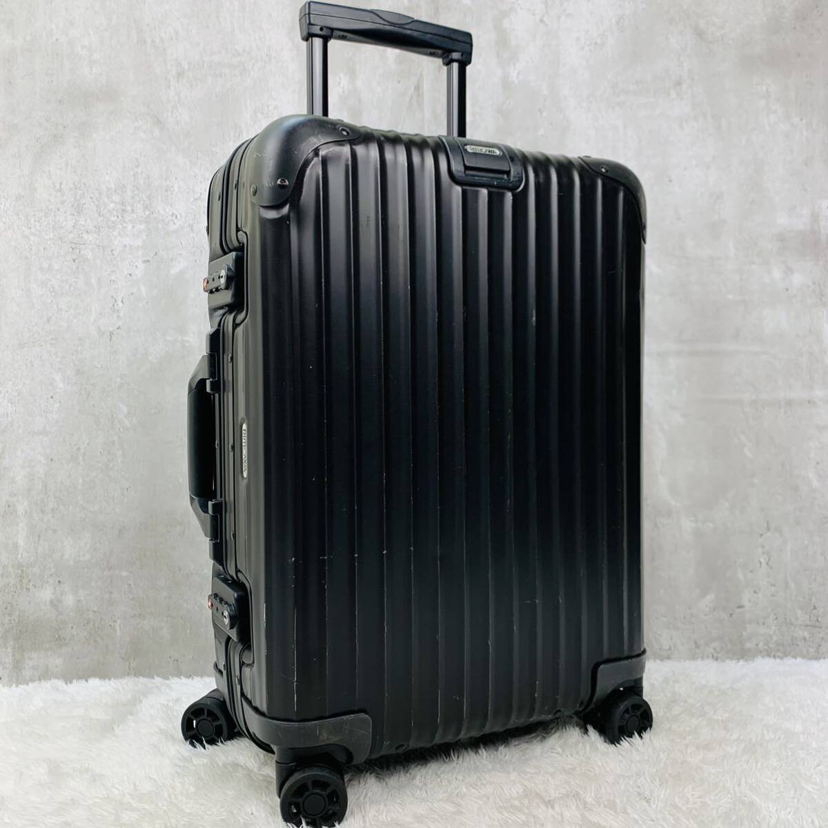 【人気モデル】RIMOWA リモワ TOPAS トパーズ Stealth ステルス 34L 4輪 MW 機内持ち込み TSAロック ブラック 黒 アルミ キャリーケースの画像1