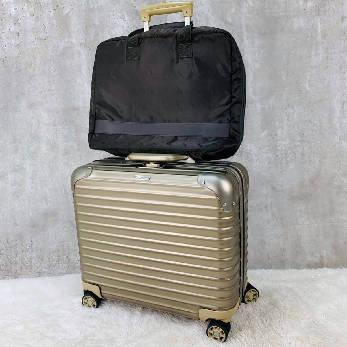 【美品】RIMOWA リモワ TOPAS トパーズ Business MW ビジネスマルチホイール 28L 機内持ち込み 4輪 TSAロック トローリー チタニウム 金色_画像1