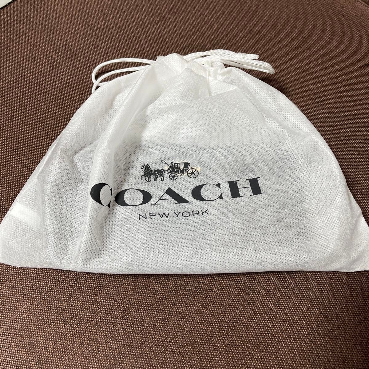 COACH ラウンドファスナー長財布 ブラウン