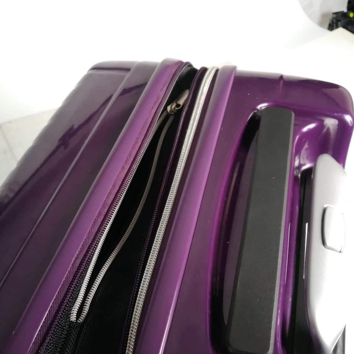 中古246　サンコー鞄　Sサイズ　 スーツケース　拡張機能　HINOMOTOタイヤ　シークレットポケット　パープル