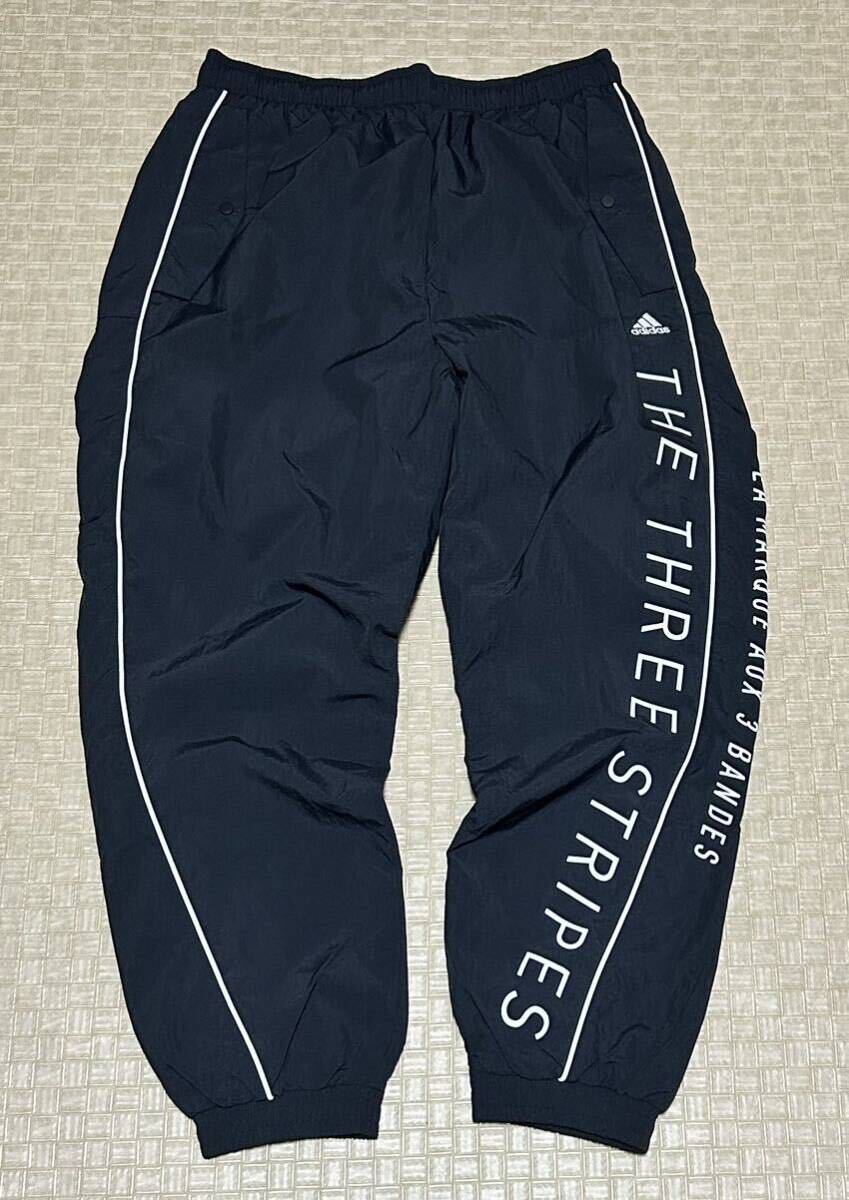 新品・XL サイズ・adidas・M WORDING WOVEN PANTS アディダス ワーディング ウーブン パンツ_画像1