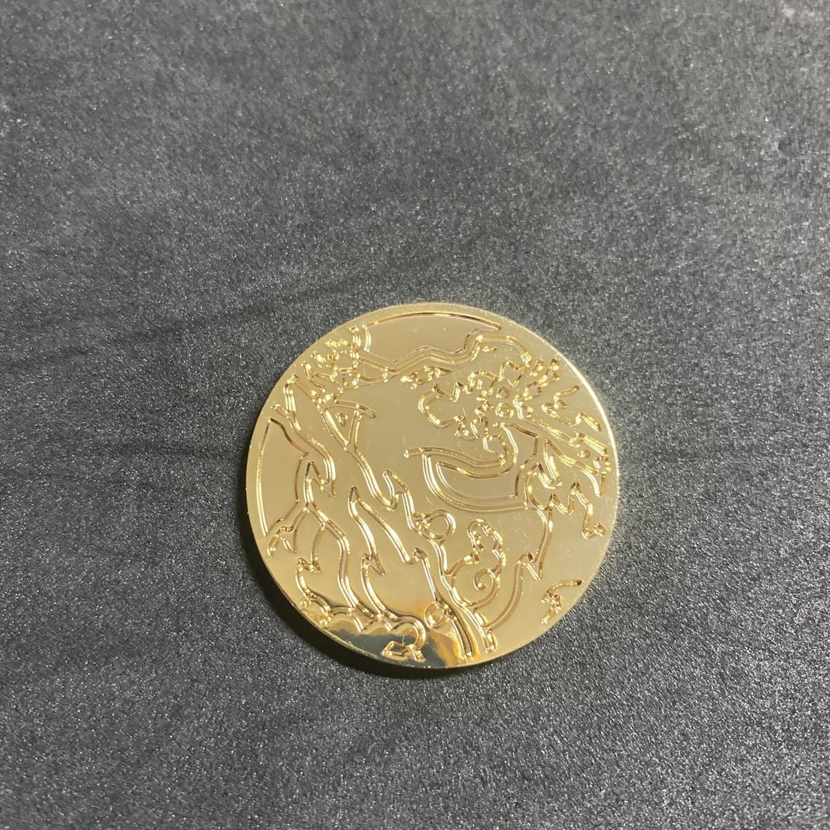 （海外限定）金属製 リザードン コインの画像1