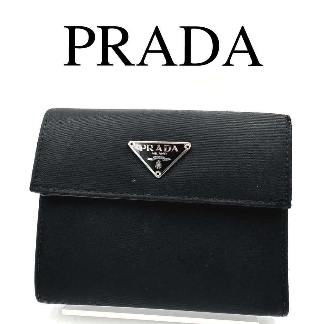 PRADA プラダ 折り財布 ロゴプレート ブラック ギャランティカード付き_画像1