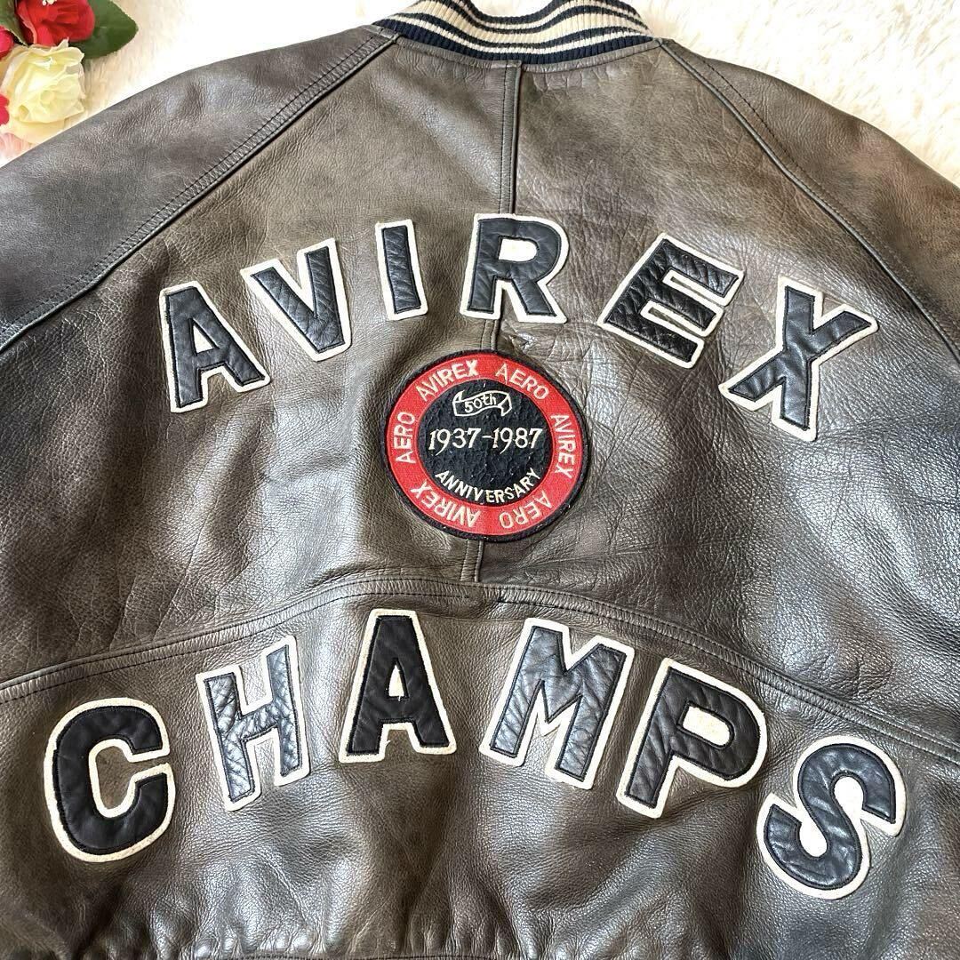 超希少/50周年記念モデル/XL/AVIREX CHAMPS アビレックス 80's レザーフライトジャケット スタジャン MA1 キルティング アーチロゴ 本革の画像2