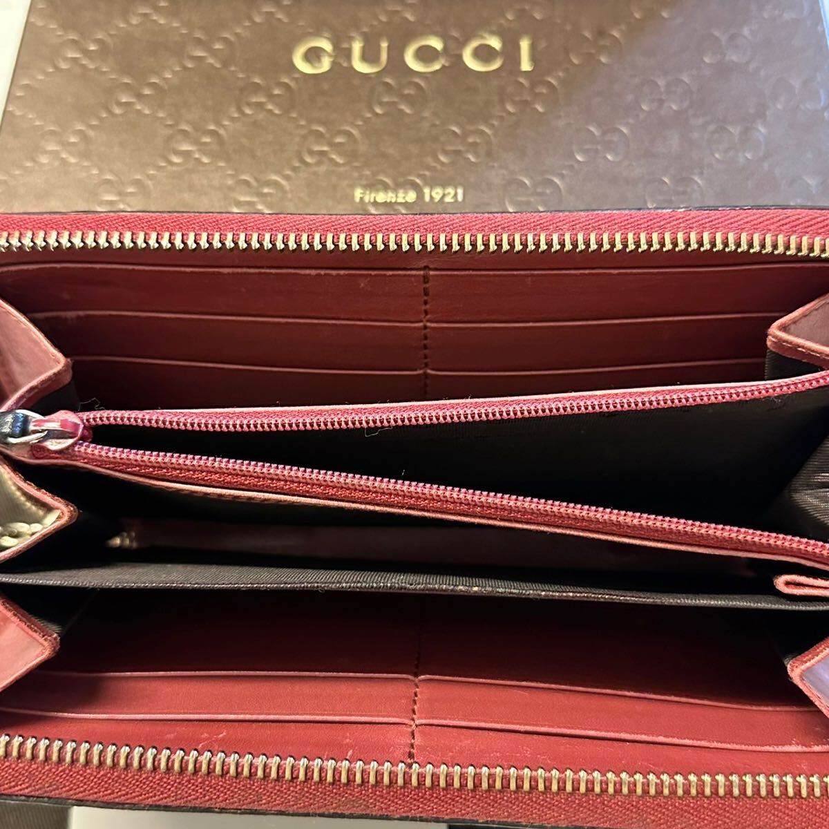 グッチ　GUCCI 財布　長財布　シマレザー　ハート金具　ラウンドファスナー　レディース　