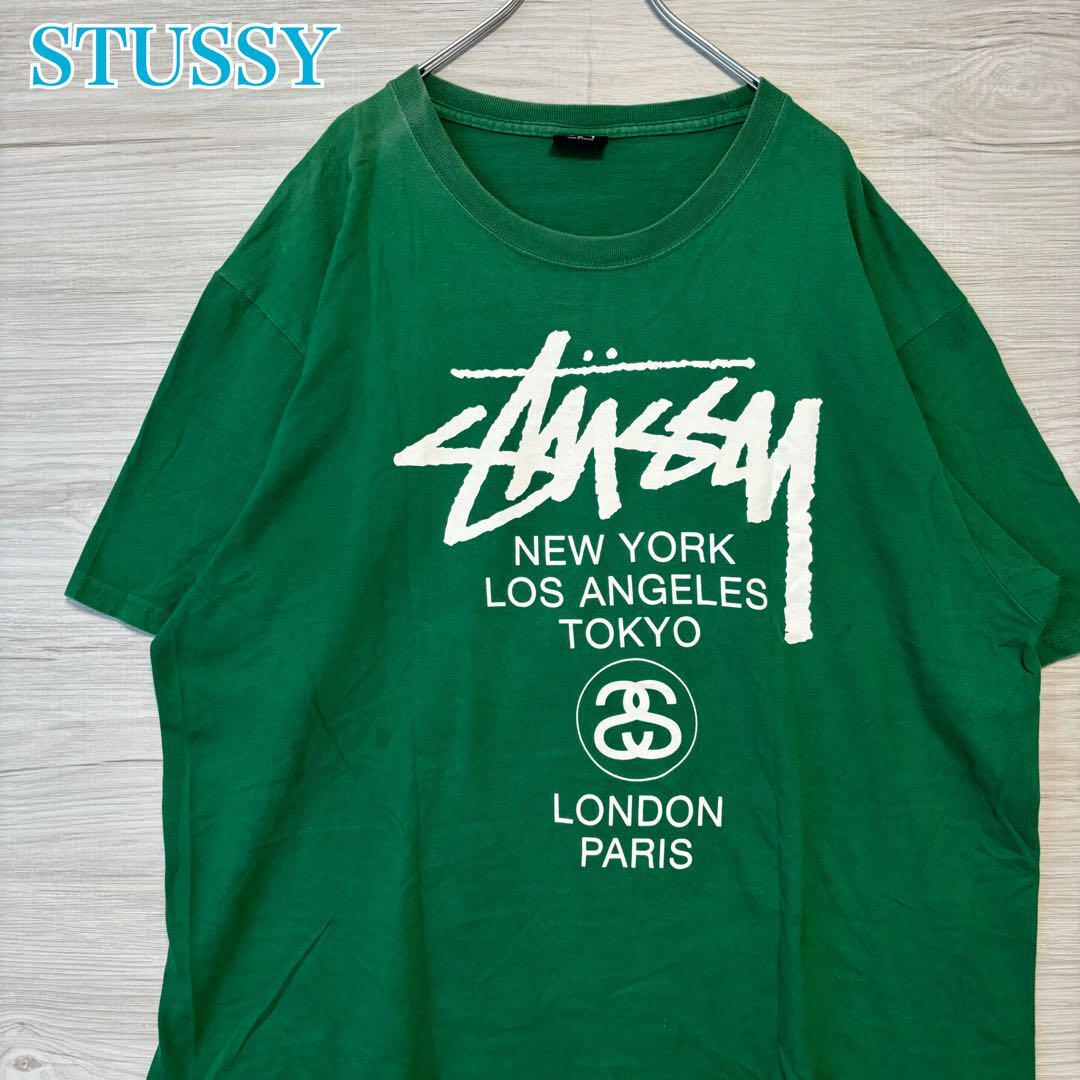 【人気デザイン】STUSSY ステューシー　Tシャツ　XLサイズ　ワールドツアー　両面デザイン　バックプリント　ストリート　即完売　ゆったり_画像1