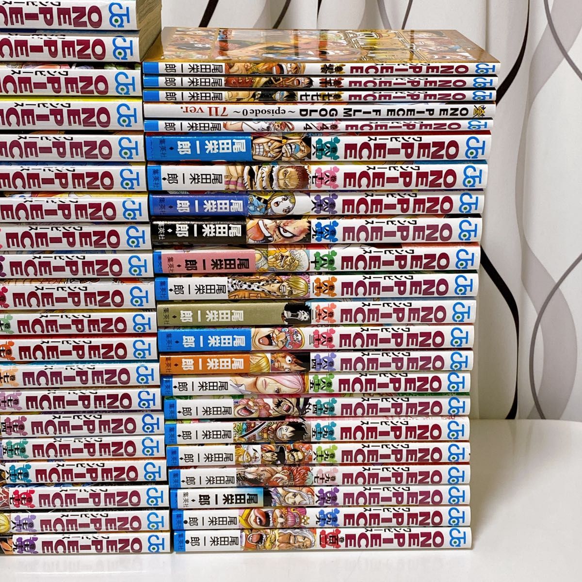 ワンピース　漫画　1巻-102巻　+関連本5冊　非 全巻セット　初版 多数 尾田栄一郎 ONE PIECE 映画特典