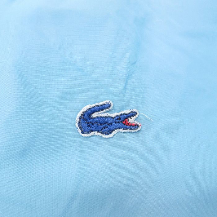 L/古着 ラコステ LACOSTE IZOD 長袖 ブランド ナイロン ジャケット メンズ 80s ワンポイントロゴ 水色 23sep29 中古 アウター ウインド_画像3