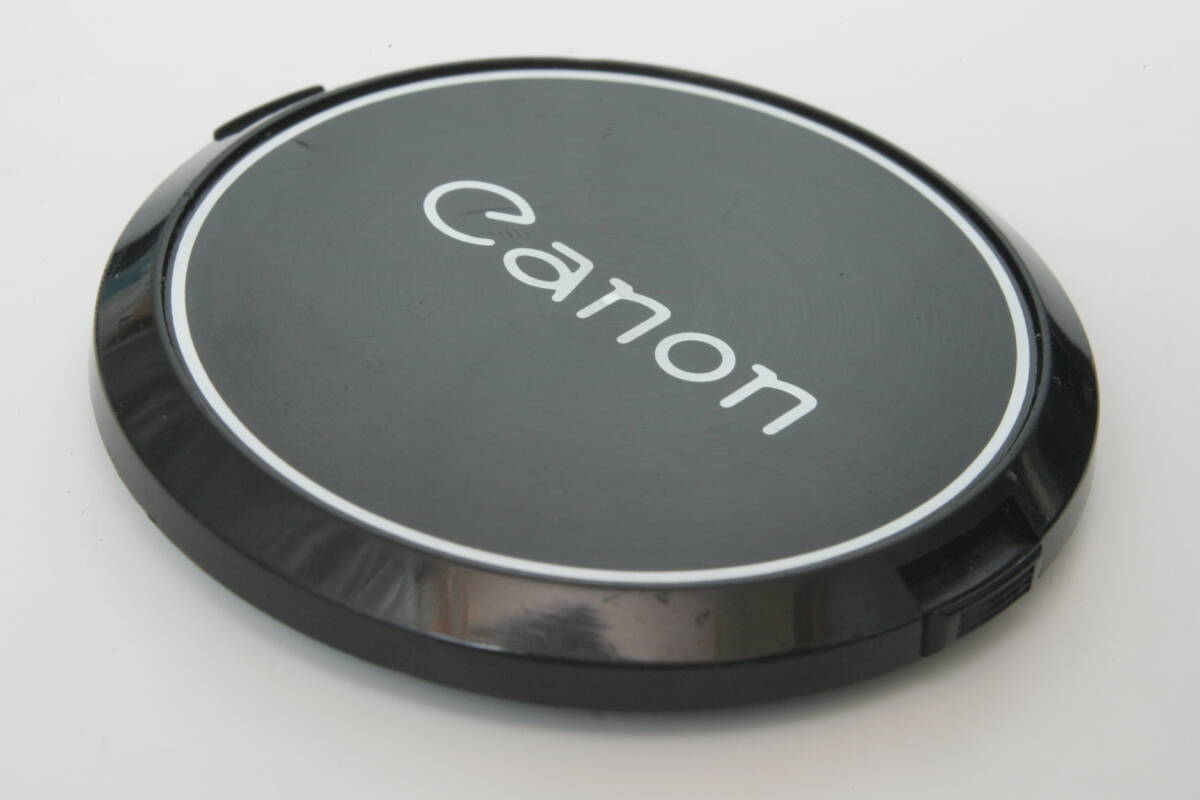  old Canon front lens cap C-55mm clip-on type used small with defect goods 