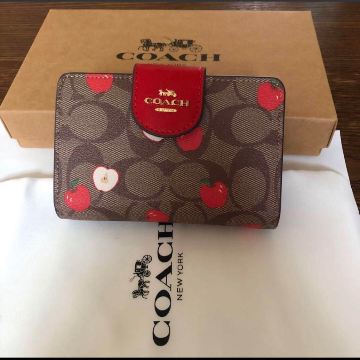 COACH 二つ折り財布