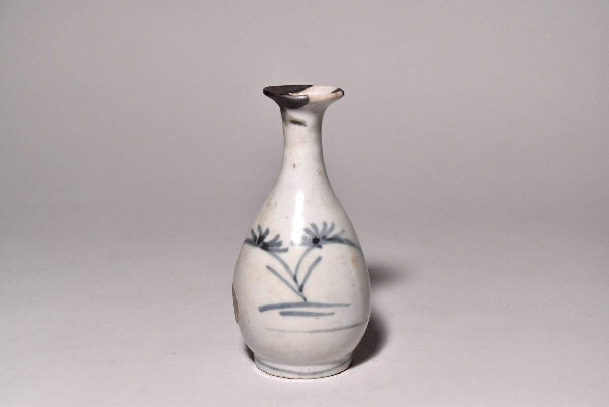 [ chestnut .] departure . the first period Imari . writing sake bottle ( Edo era )