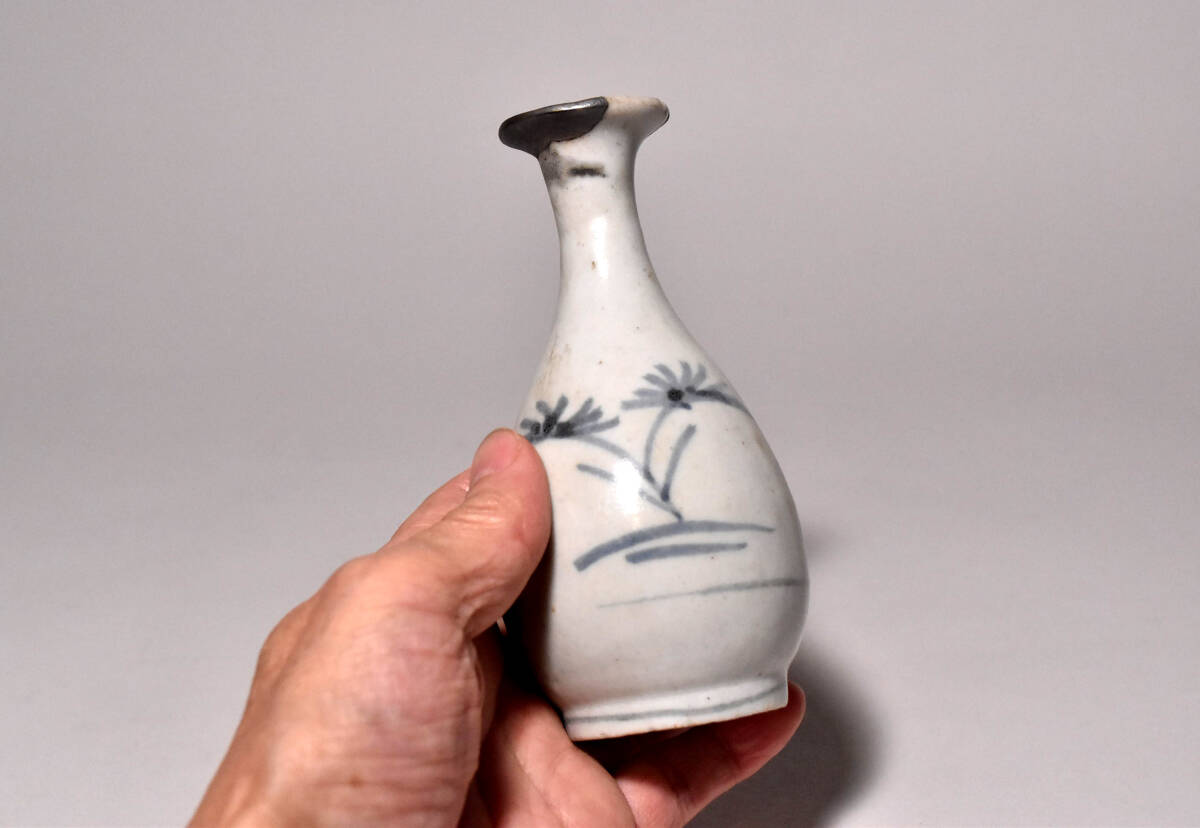 [ chestnut .] departure . the first period Imari . writing sake bottle ( Edo era )