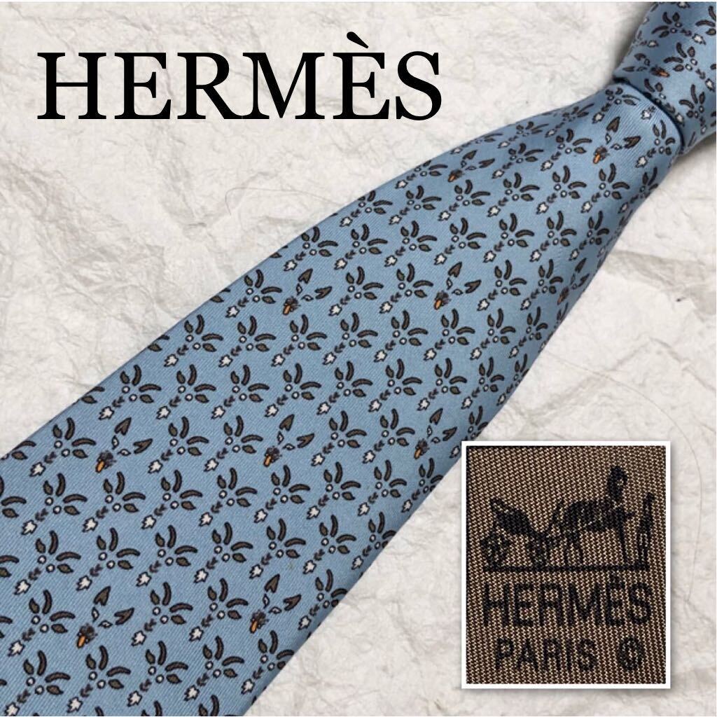 HERMES エルメス　ネクタイ　山羊と狼　ヤギ　オオカミ　顔　総柄　シルク100% フランス製　ライトブルー_画像1