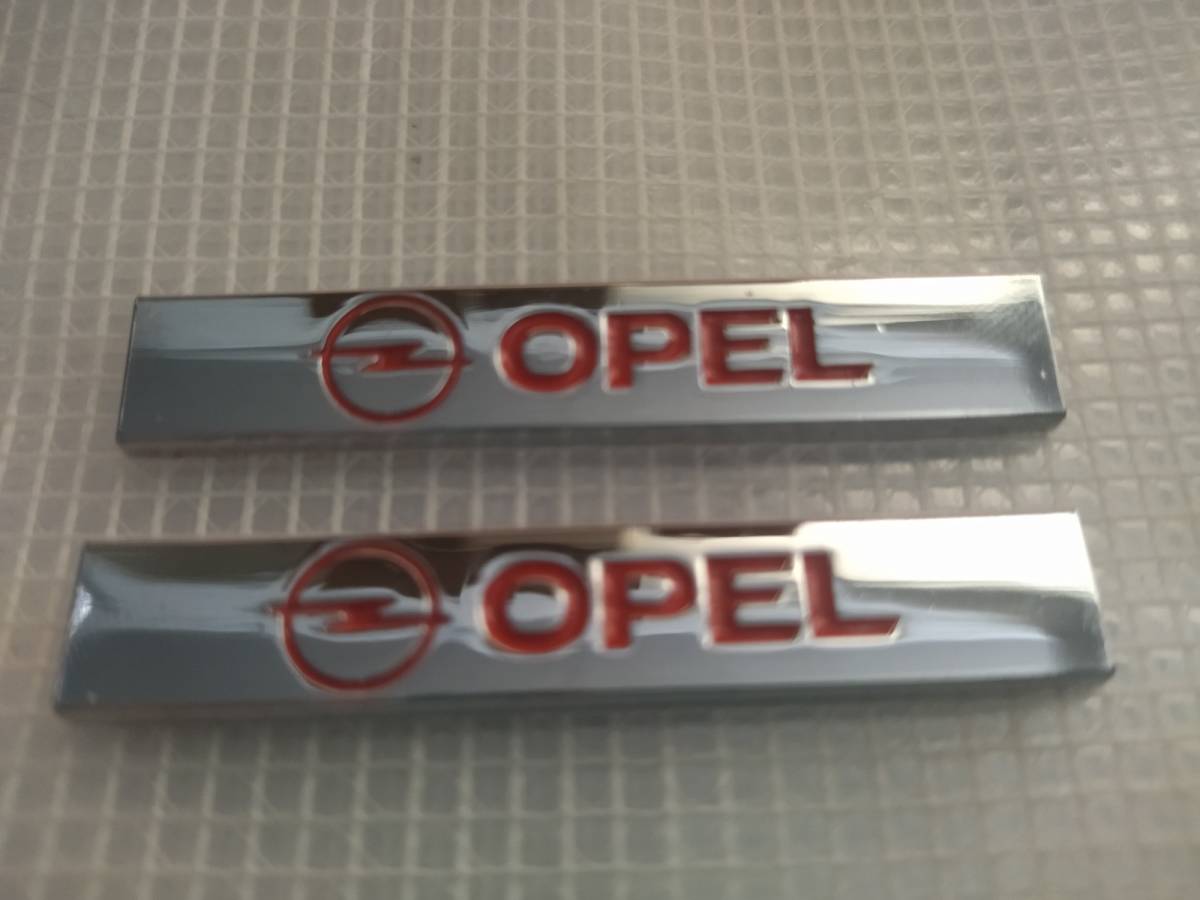 【送料込】OPEL(オペル) エンブレムプレート 赤文字　縦1.0cm×横6.0cm　2枚組　金属製_画像1