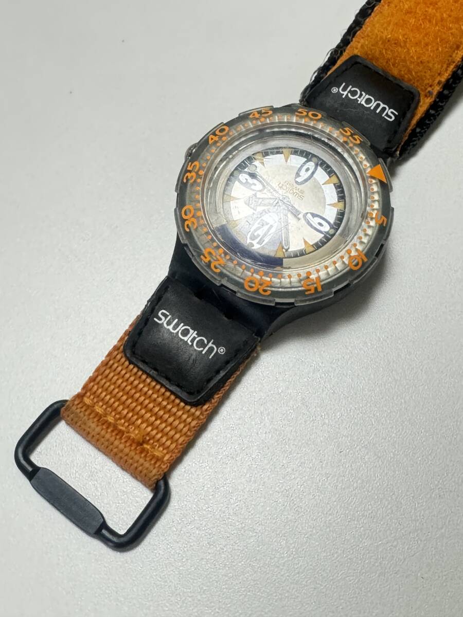 L212 wristwatch SWATCH/ Swatch SWISS quartz round analogue orange nylon belt 