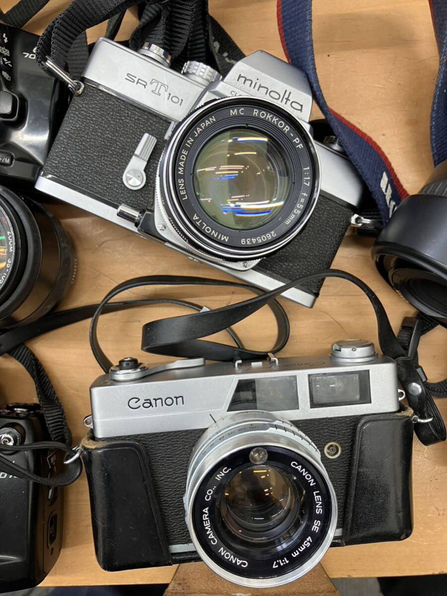 [c340] camera binoculars . summarize Canon MINOLTA PENTAX OLYMPUS RICOH Panasonic single‐lens reflex film camera video camera 