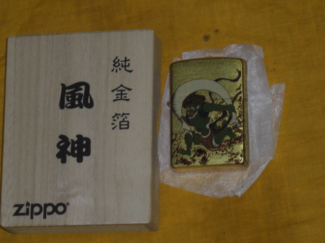 ☆ ZIPPO オイルライター　未使用　純金箔　風神　木箱入り☆_画像1