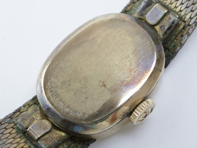2403-659 オメガ 手巻き式 腕時計 金色 ローマン文字盤 純正ベルトの画像6