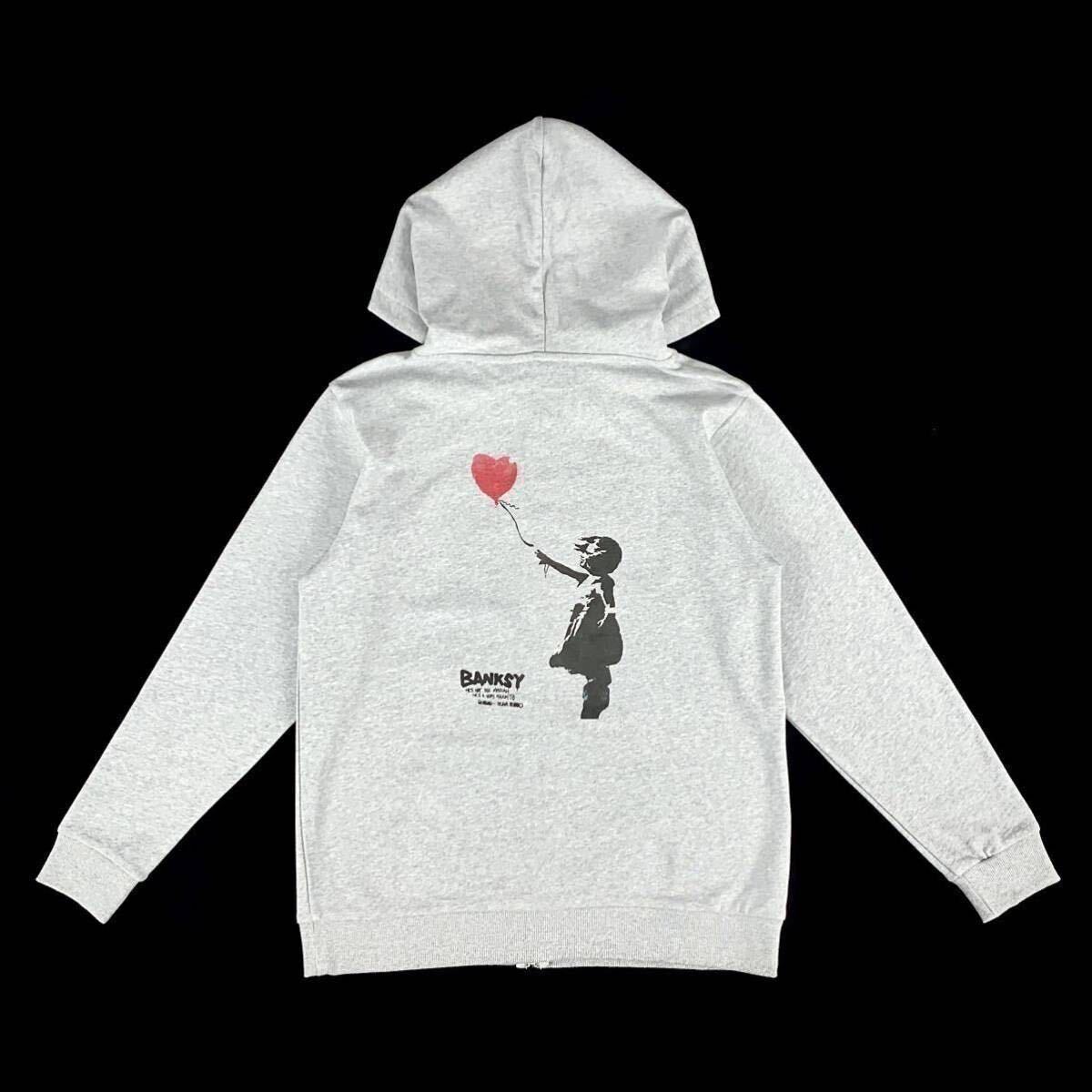 新品 BANKSY バンクシー 愛はごみ箱の中に 風船と少女 シュレッダー 左向き バックプリント ジップアップ パーカー ユニセックス Lサイズ